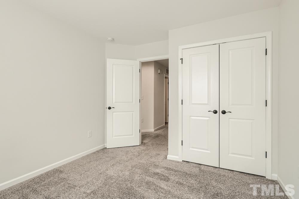 2557 Rambling Creek Road Apex, NC 27523 - Photo 17 of 27 a view of an empty room