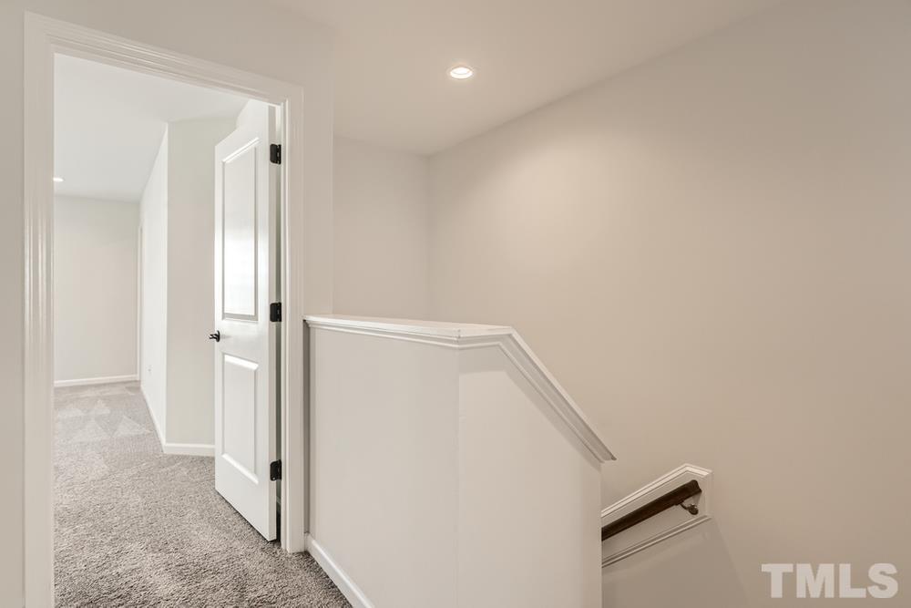 2557 Rambling Creek Road Apex, NC 27523 - Photo 21 of 27 a view of a hallway with closet and entryway
