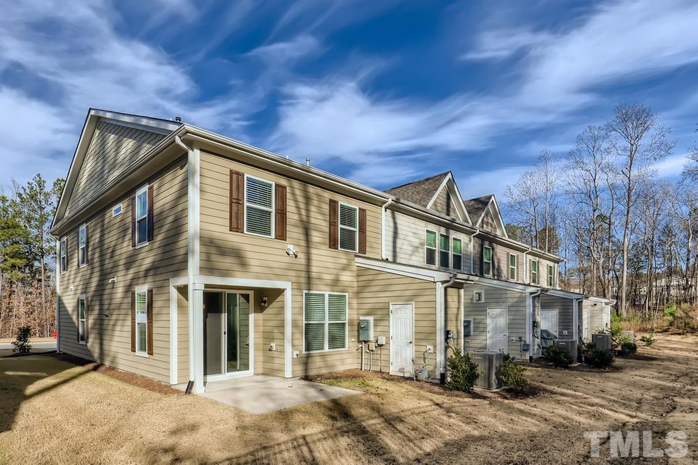 2557 Rambling Creek Road Apex, NC 27523 - Photo 25 of 27 a view of a large building