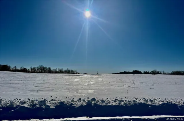 a view of ocean with a beach