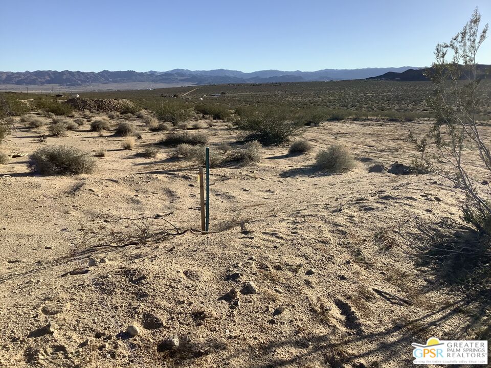 0 Winters Road Joshua Tree, CA 92252 - Photo 27 of 30 a view of a dry yard with mountains in the background