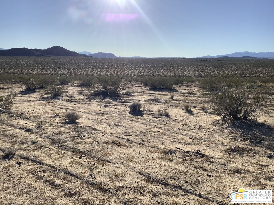 0 Winters Road Joshua Tree, CA 92252 - Photo 7 of 30 a view of a town with mountains in the background