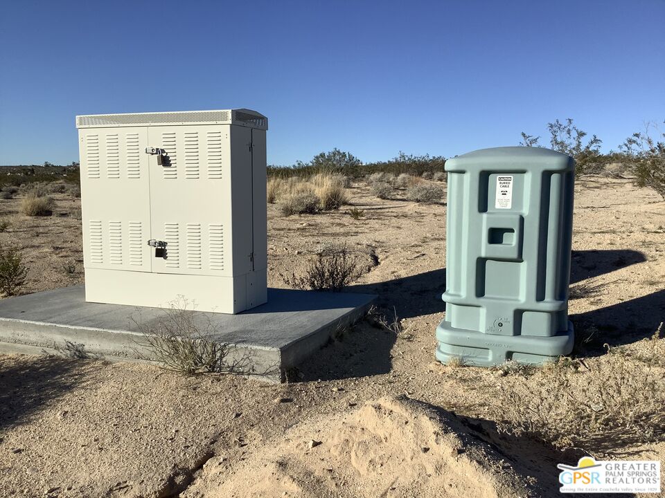 0 Winters Road Joshua Tree, CA 92252 - Photo 9 of 30 a front view of a house with a yard