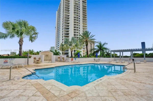 a view of outdoor space with tall buildings