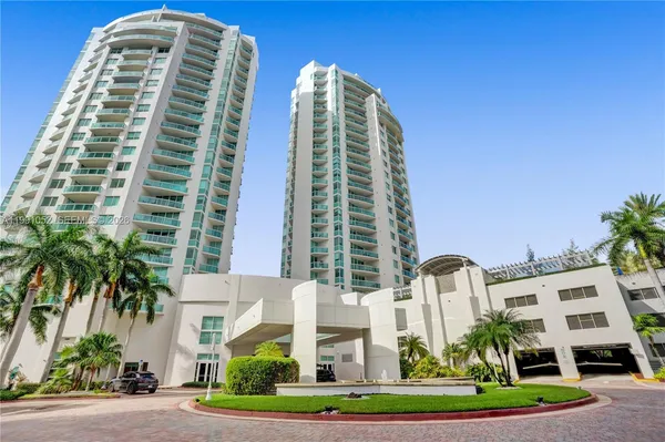 a view of a city with tall buildings