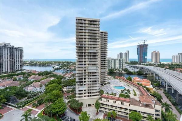a view of a city with tall buildings