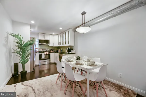 a view of a dining room with furniture