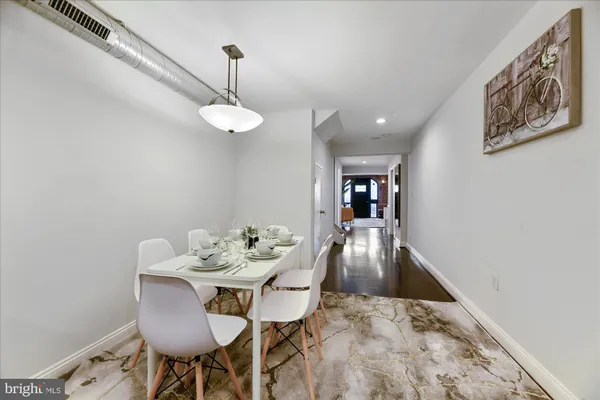 a view of a dining room with furniture