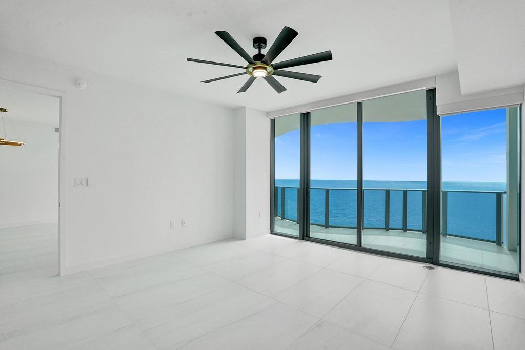 900 North Ocean Boulevard, Unit 1405 Pompano Beach, FL 33062 - Photo 14 of 59 a view of an empty room with a ceiling fan