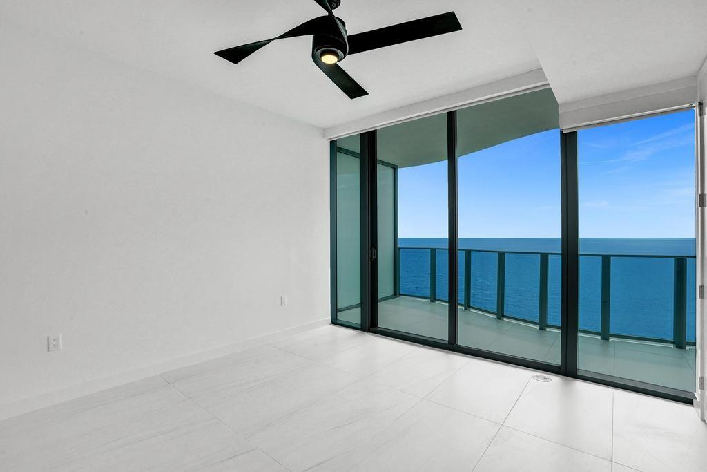 900 North Ocean Boulevard, Unit 1405 Pompano Beach, FL 33062 - Photo 21 of 59 a view of a room with window