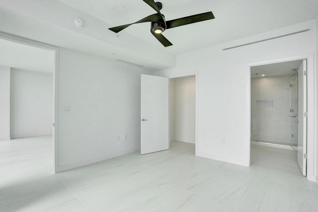 900 North Ocean Boulevard, Unit 1405 Pompano Beach, FL 33062 - Photo 22 of 59 a view of a room with ceiling fan