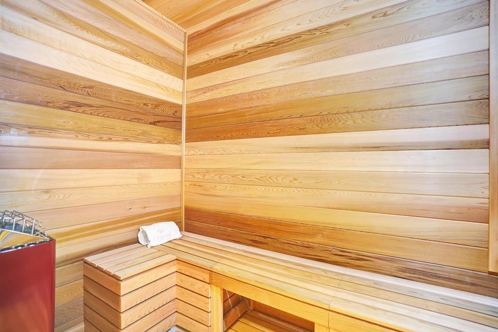 900 North Ocean Boulevard, Unit 1405 Pompano Beach, FL 33062 - Photo 42 of 59 a view of a room with stairs and a wooden floor