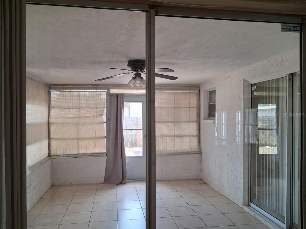 6821 Mesa Verde Street Port Richey, FL 34668 - Photo 19 of 19 a view of an empty room and window