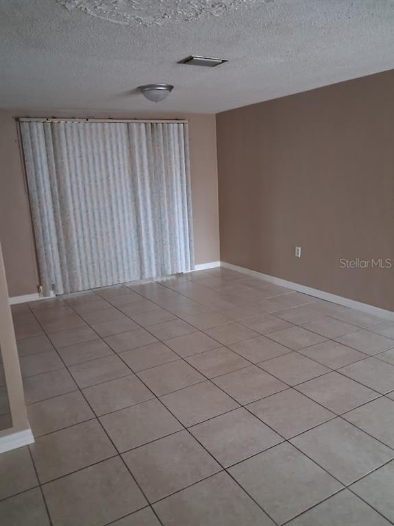 6821 Mesa Verde Street Port Richey, FL 34668 - Photo 4 of 19 a view of wooden floor