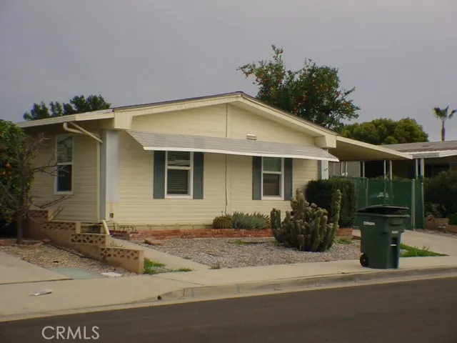 a front view of a house with patio