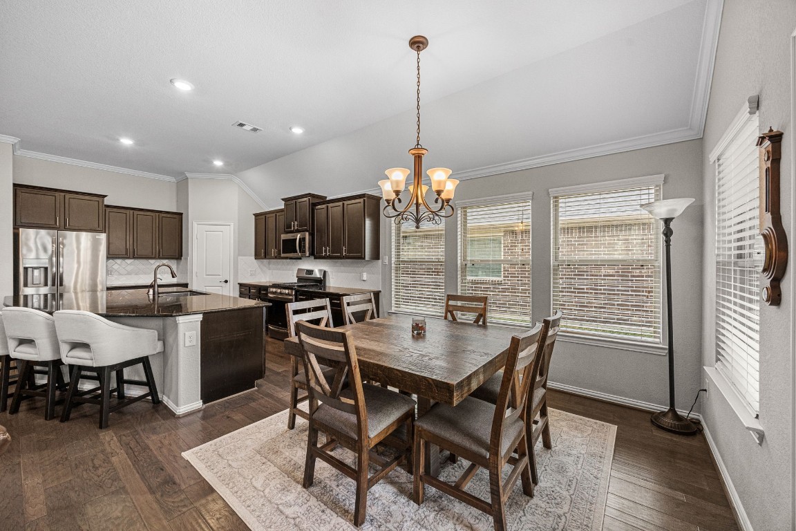 31521 Timber Grove Lane Spring, TX 77386 - Photo 11 of 30 The bright, open breakfast room offers easy access to the outdoors—perfect for indoor-outdoor living