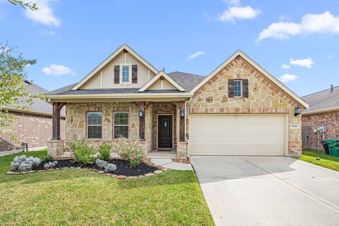 31521 Timber Grove Lane Spring, TX 77386 - Photo 4 of 30 Mature landscaping with great curb appeal