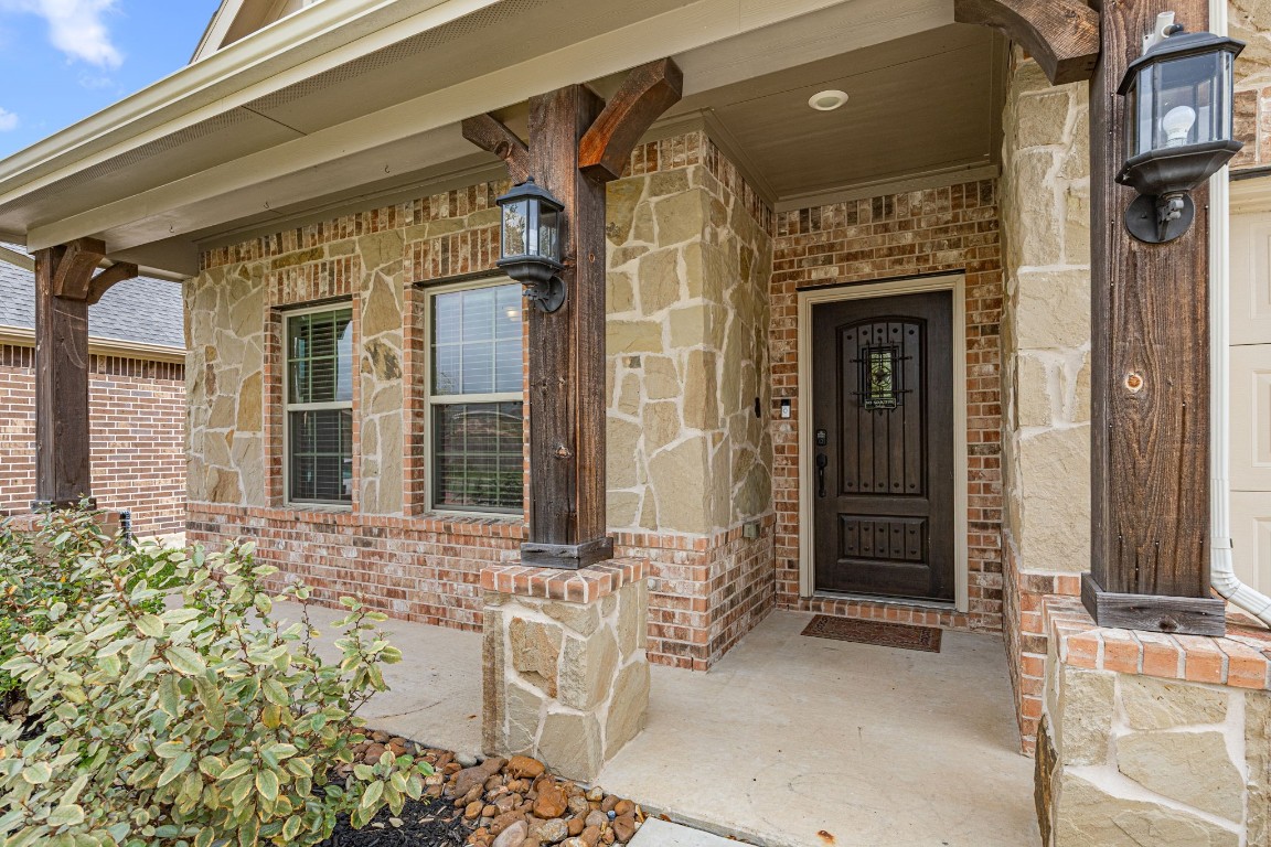 31521 Timber Grove Lane Spring, TX 77386 - Photo 5 of 30 Covered patio and porch leading to front door