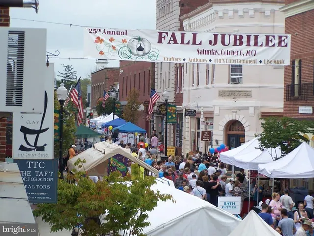 a front view of a house with a street