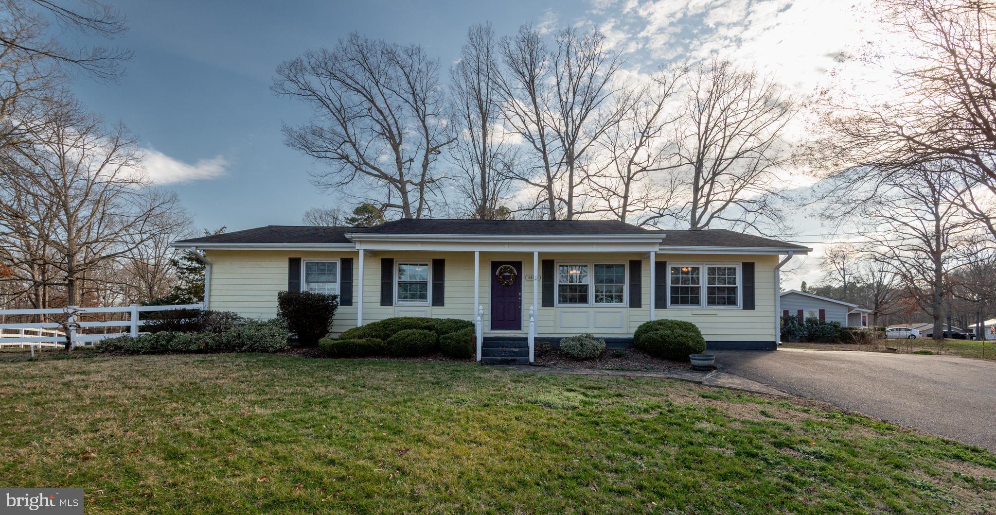 44125 Louisdale Road California, MD 20619 - Photo 24 of 44 a front view of a house with garden