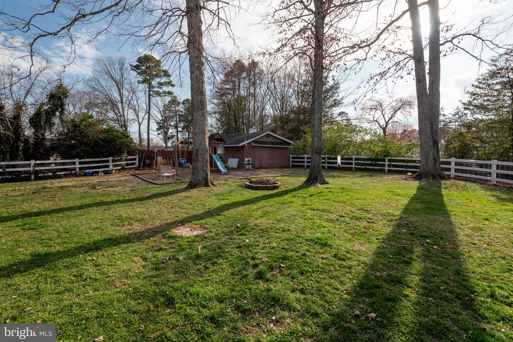 44125 Louisdale Road California, MD 20619 - Photo 37 of 44 a view of a swimming pool with a yard
