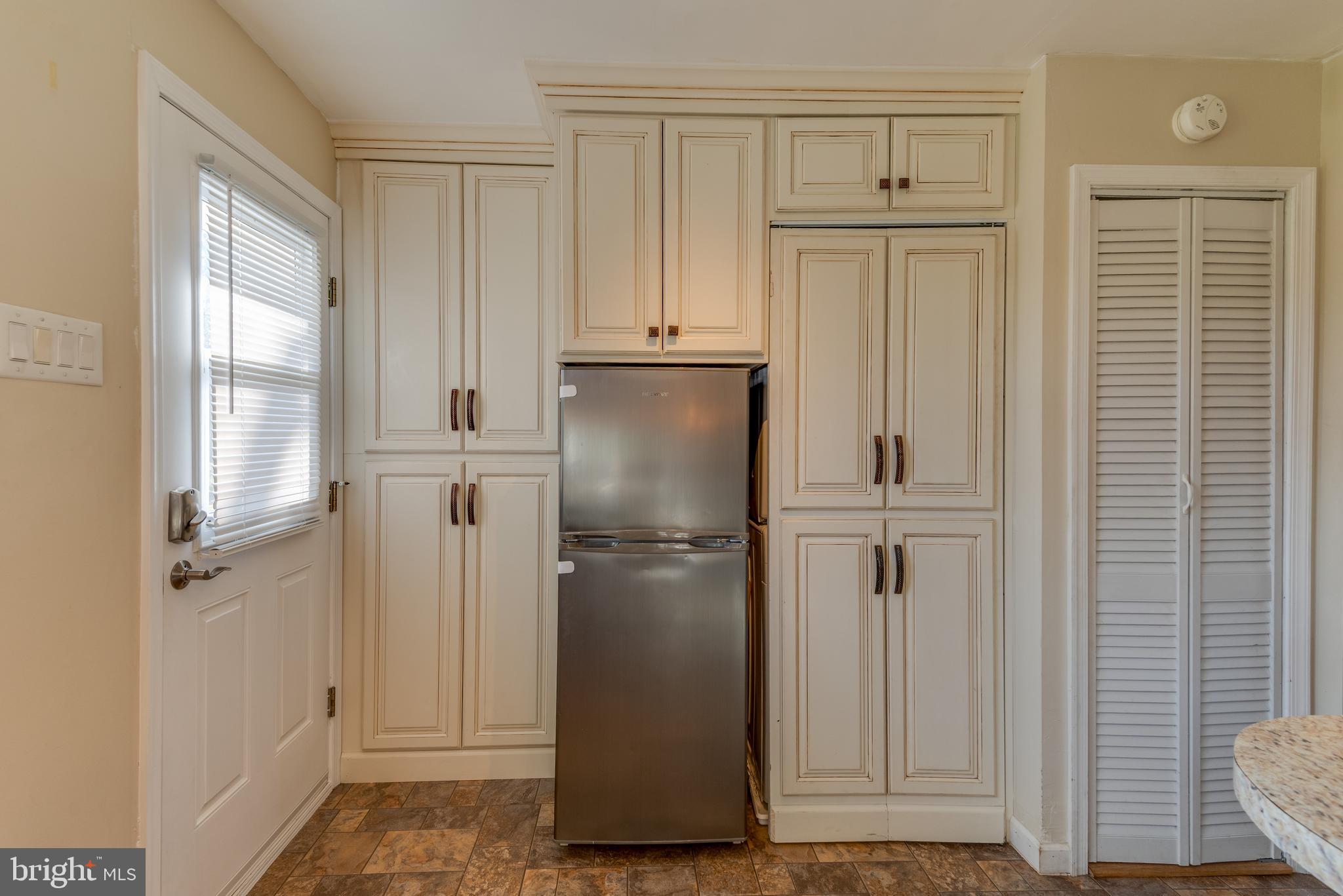 44125 Louisdale Road California, MD 20619 - Photo 7 of 44 a view of kitchen with wooden floor