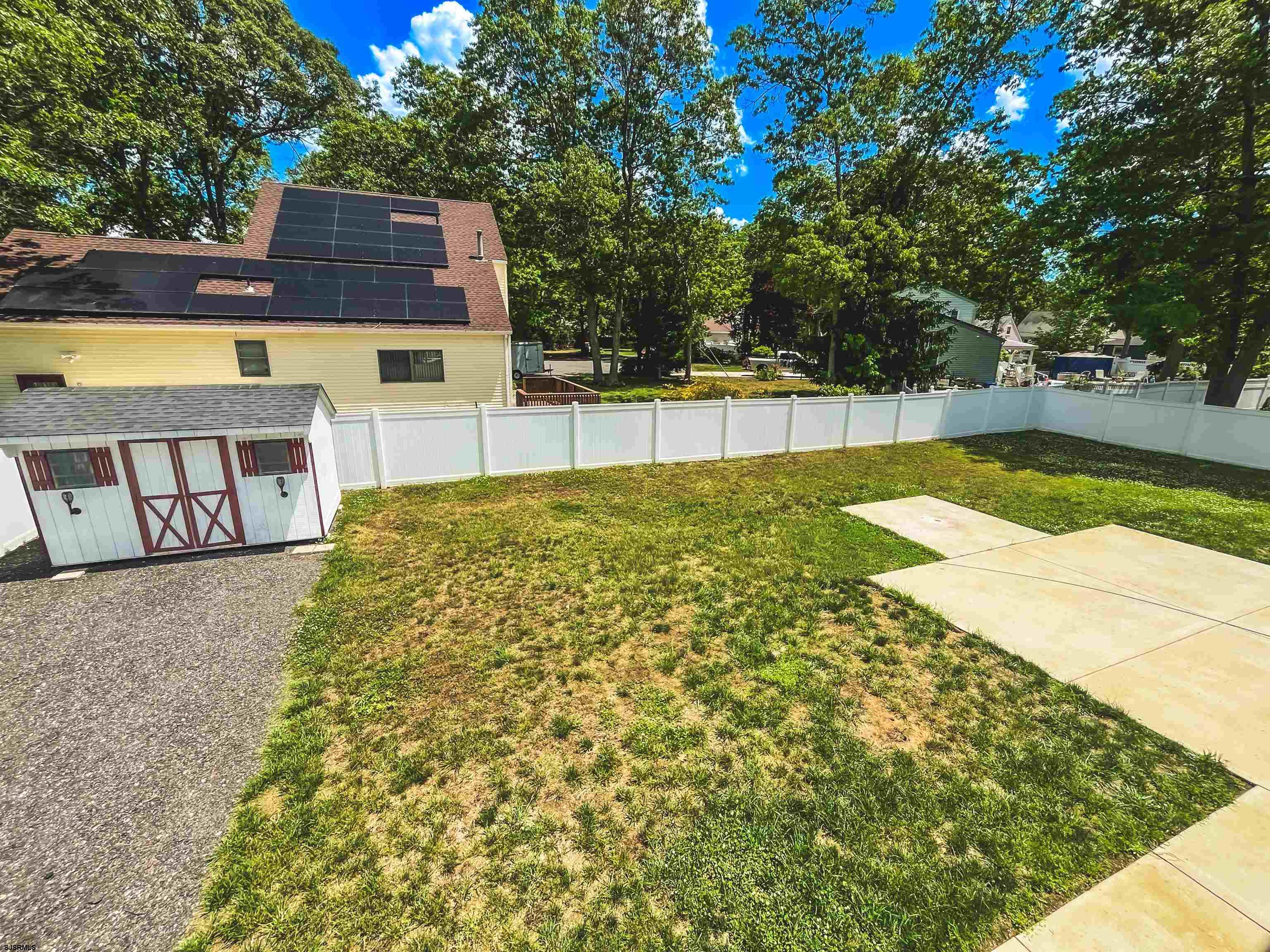 518 Delaware Avenue Absecon, NJ 08201 - Photo 30 of 38 a view of swimming pool with a yard