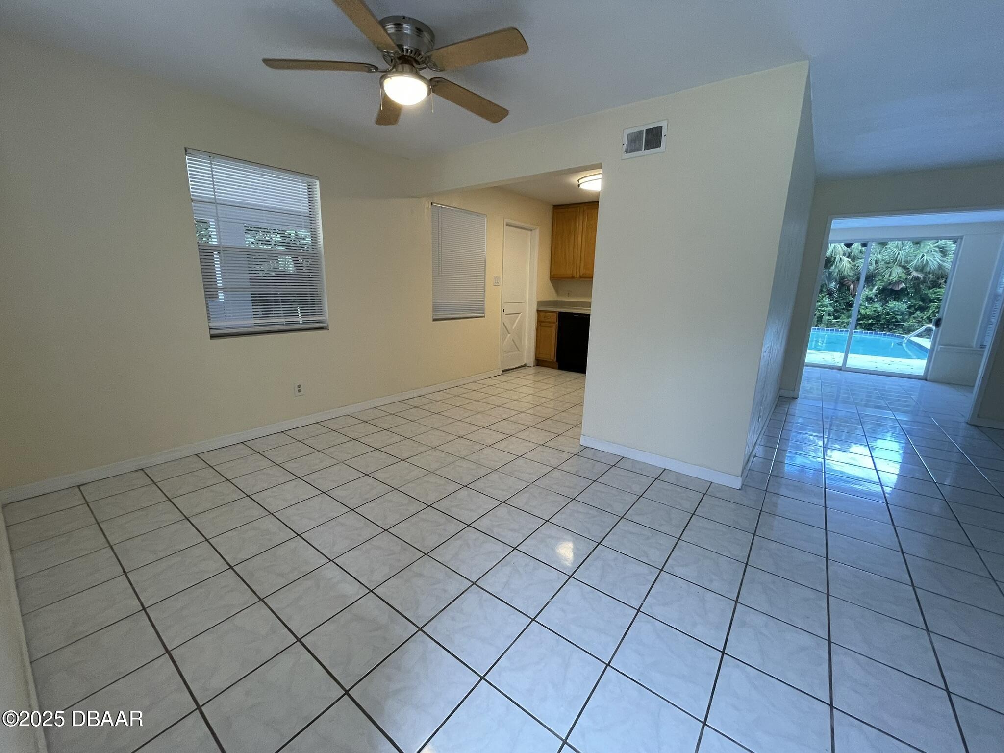 525 Tarragona Way Daytona Beach, FL 32114 - Photo 11 of 47 a view of an empty room and window