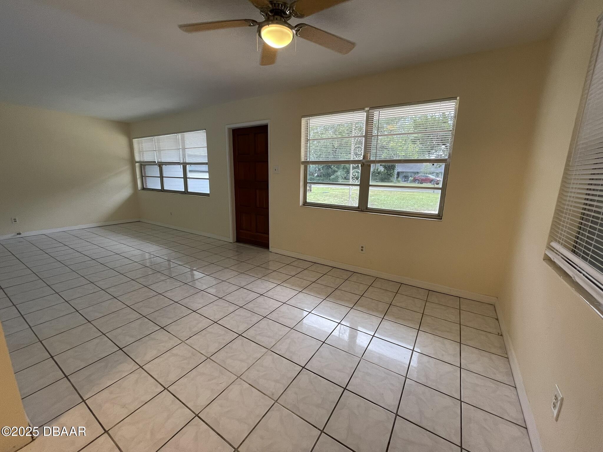 525 Tarragona Way Daytona Beach, FL 32114 - Photo 15 of 47 a view of an empty room and window