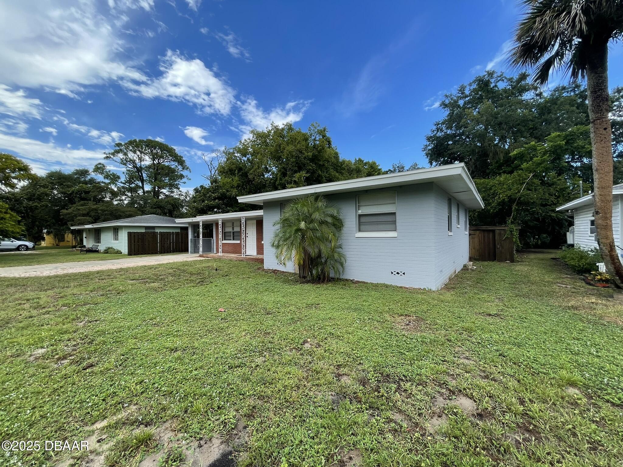 525 Tarragona Way Daytona Beach, FL 32114 - Photo 47 of 47 a house view with a garden space
