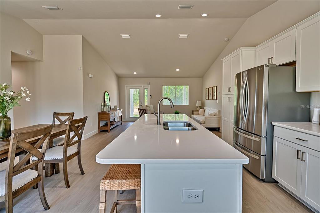 135 Hartford Street Hawthorne, FL 32640 - Photo 17 of 45 a view of a kitchen with a table and chairs