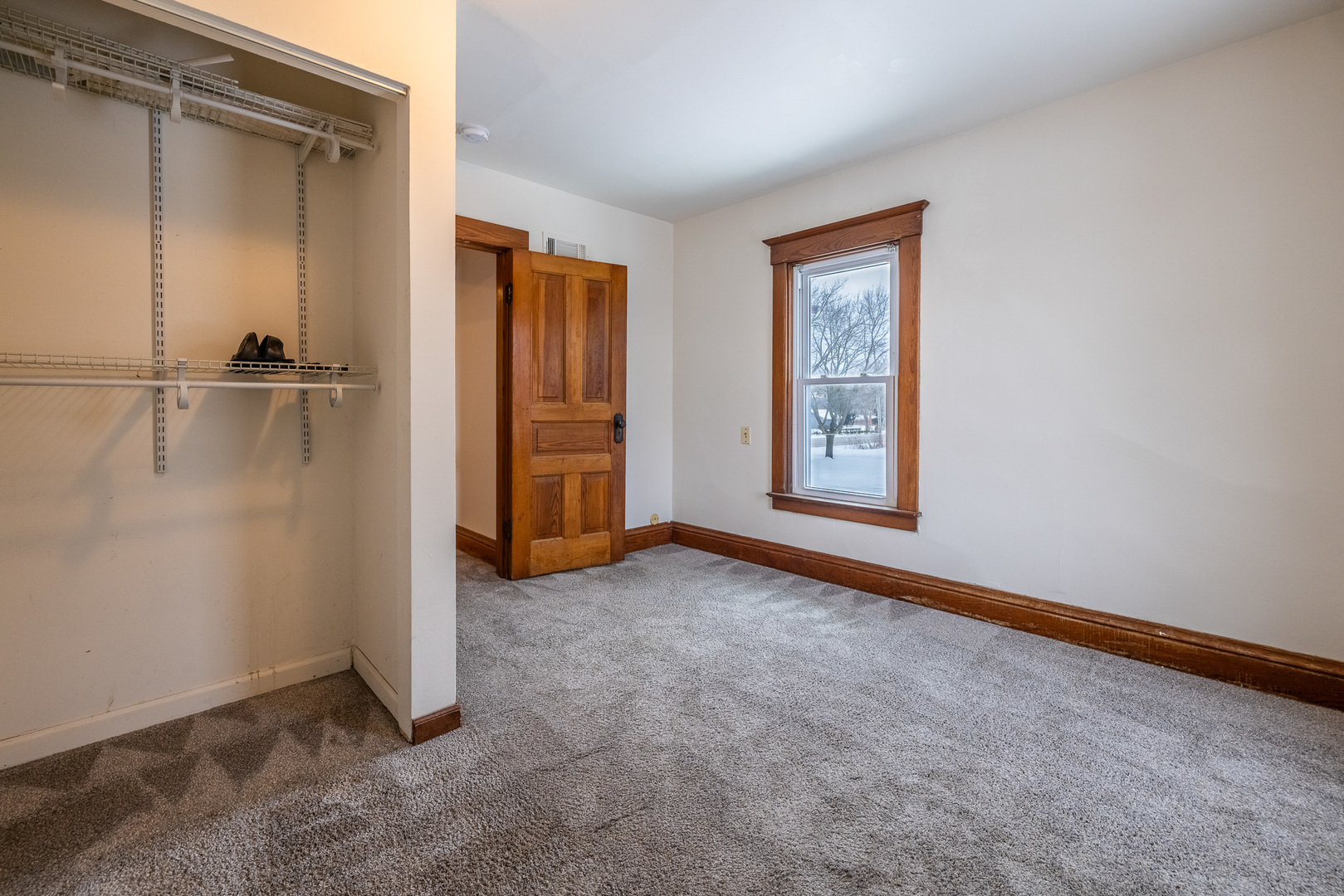 39520 North Kilbourne Road Wadsworth, IL 60083 - Photo 12 of 44 an empty room with windows and closet