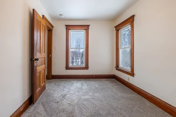 an empty room with windows