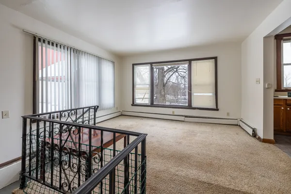 an empty room with windows