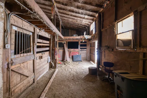 a view of a house with a snow on the road