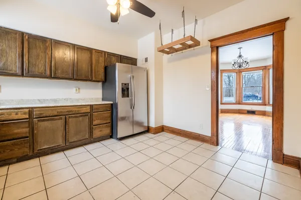 a view of a kitchen with electric appliances
