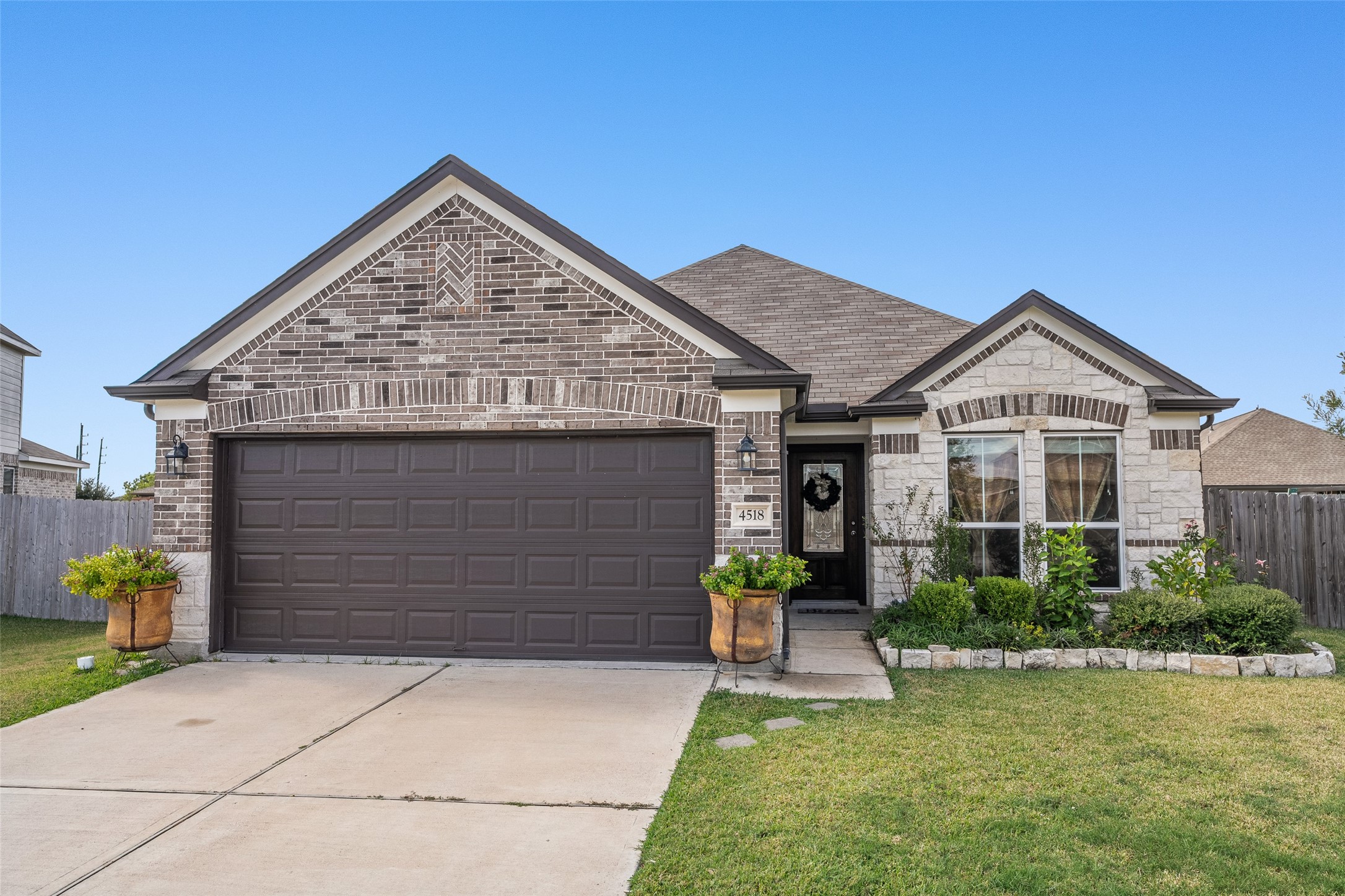 4518 Antero Court Rosenberg, TX 77471 - Photo 1 of 33 a front view of a house with garden