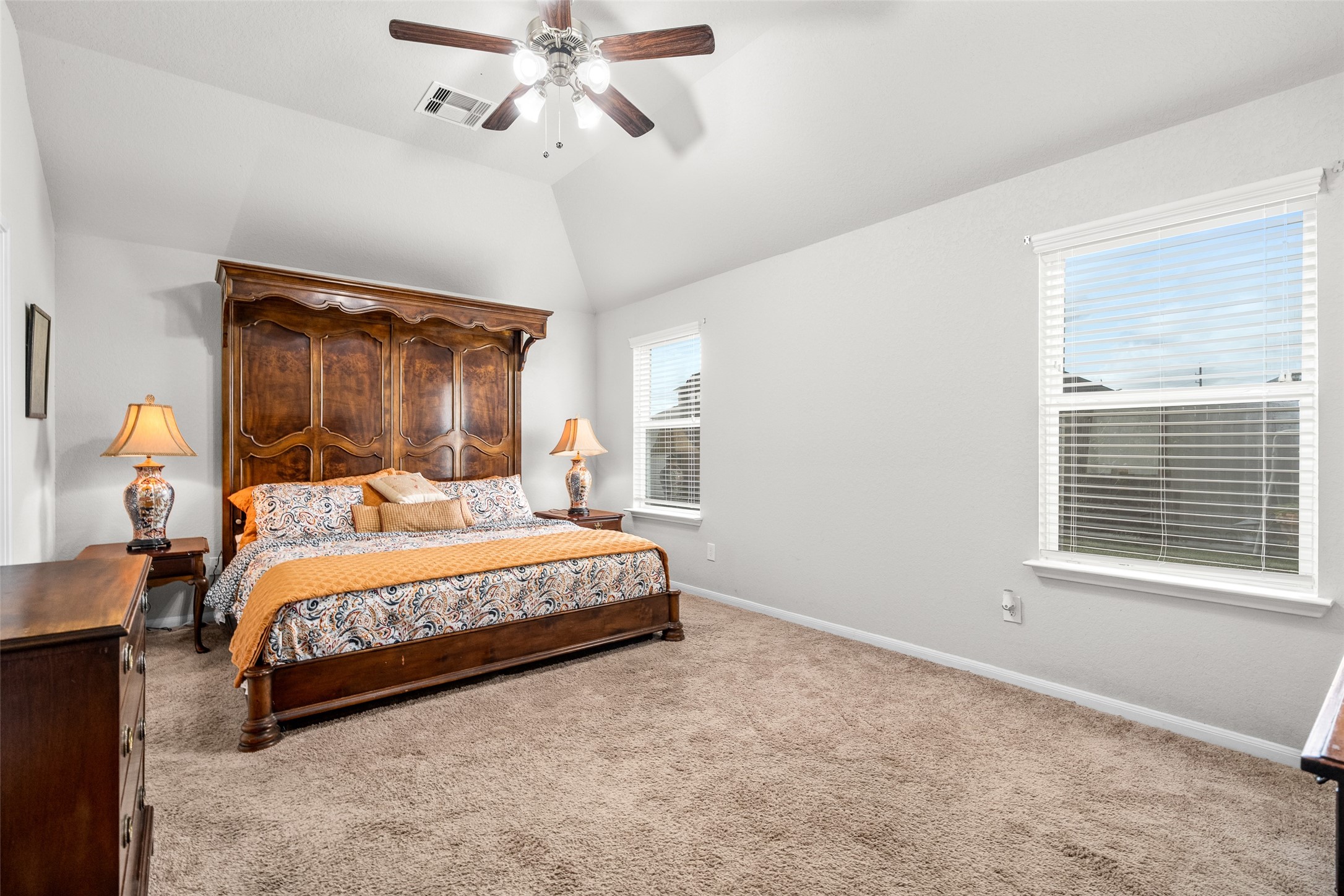 4518 Antero Court Rosenberg, TX 77471 - Photo 13 of 33 a bed sitting in a bedroom next to a window