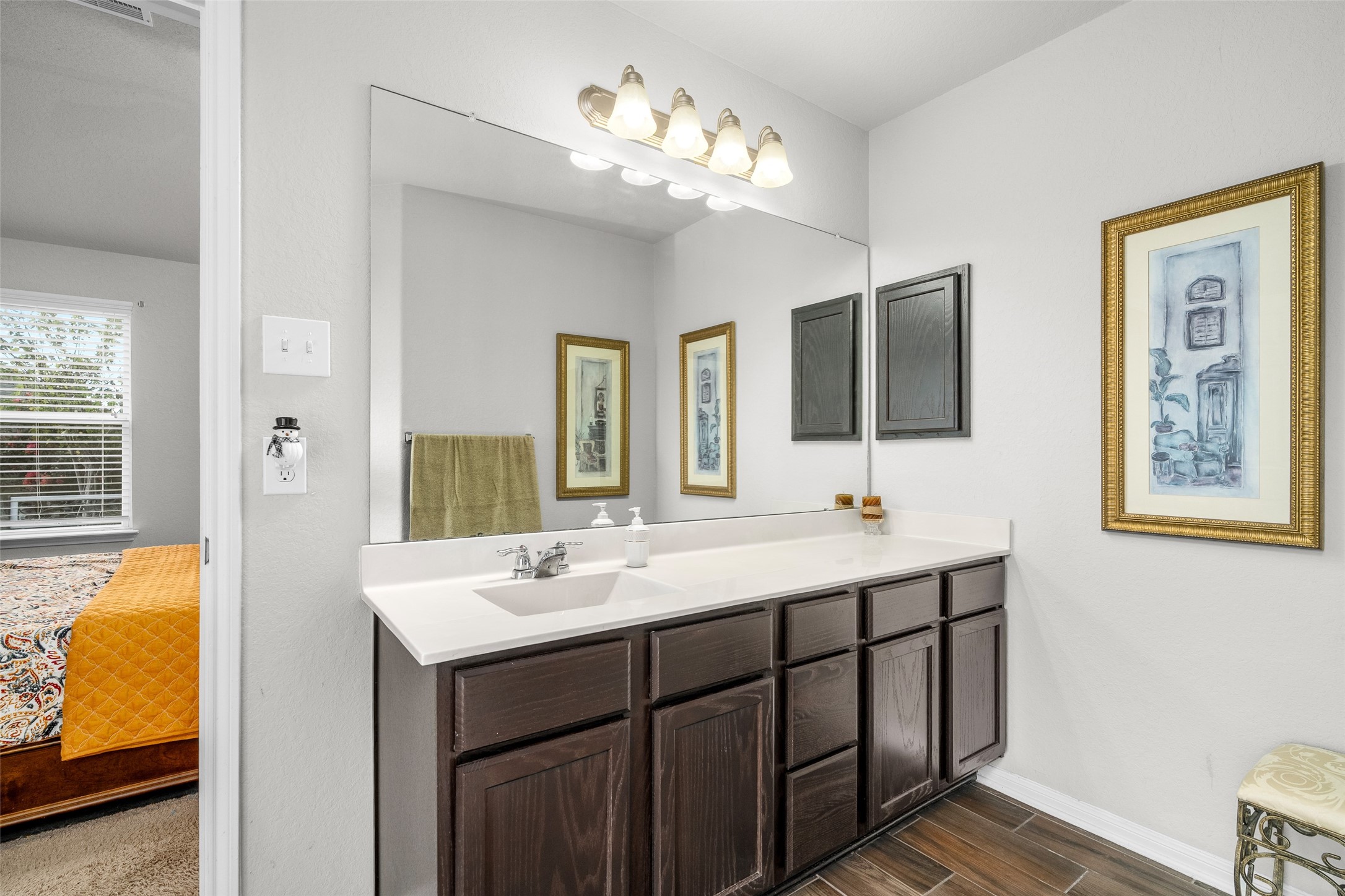 4518 Antero Court Rosenberg, TX 77471 - Photo 14 of 33 a bathroom with a double vanity sink and a mirror