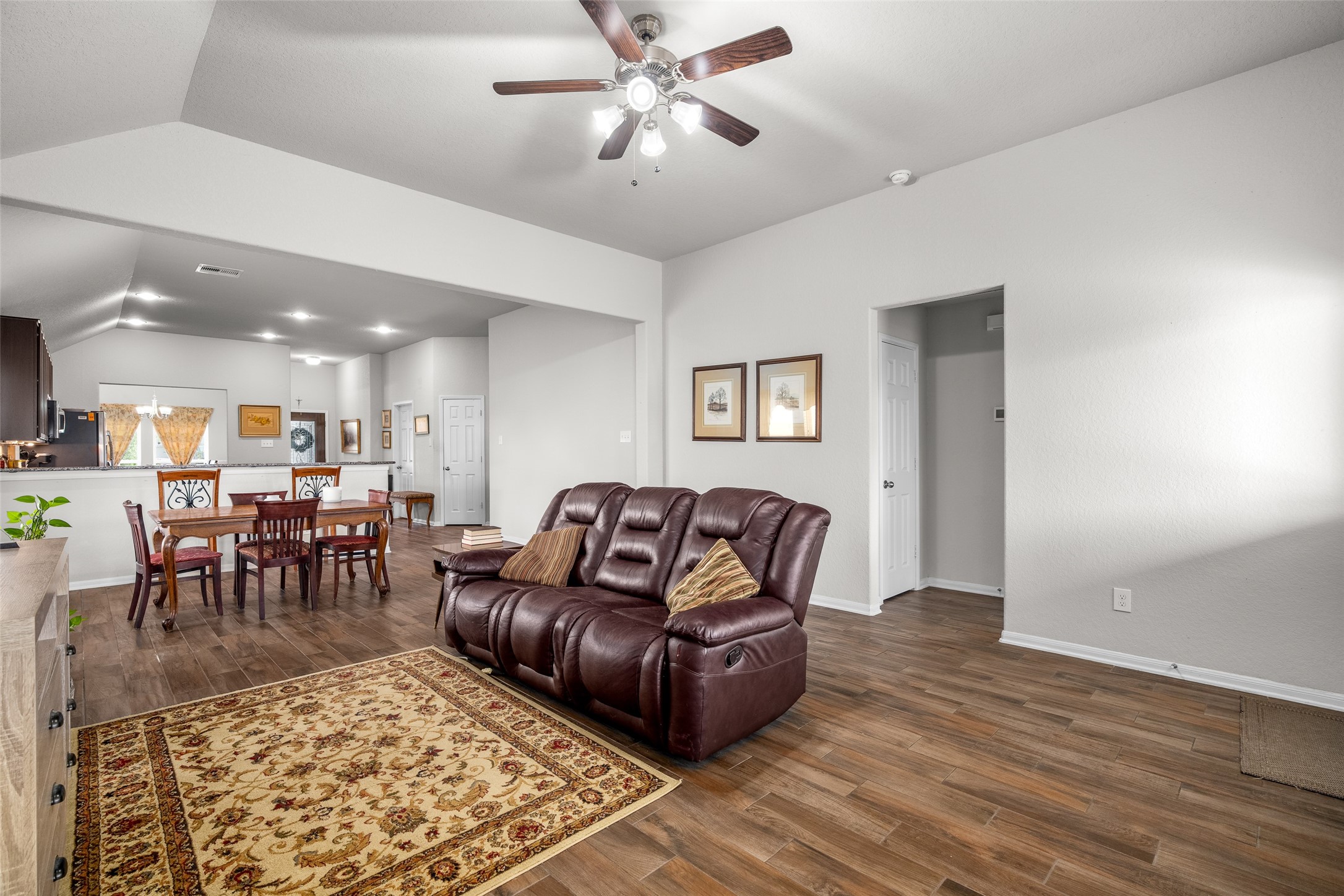4518 Antero Court Rosenberg, TX 77471 - Photo 21 of 33 a living room with furniture and a dining table