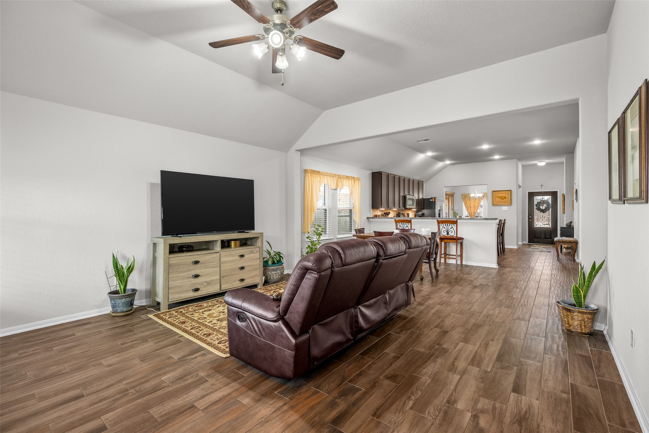4518 Antero Court Rosenberg, TX 77471 - Photo 22 of 33 a living room with furniture and a flat screen tv