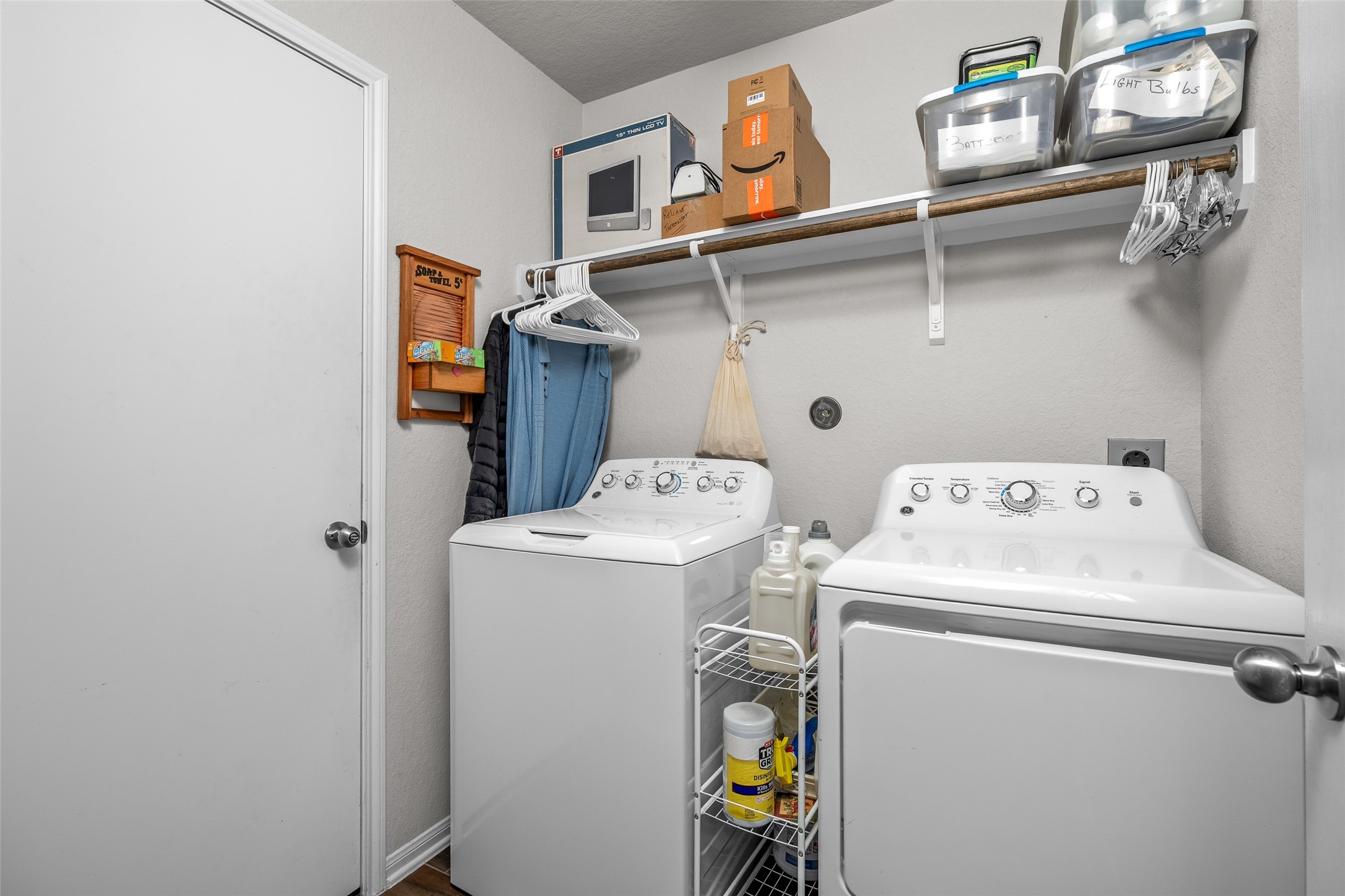 4518 Antero Court Rosenberg, TX 77471 - Photo 27 of 33 a utility room with dryer and washer