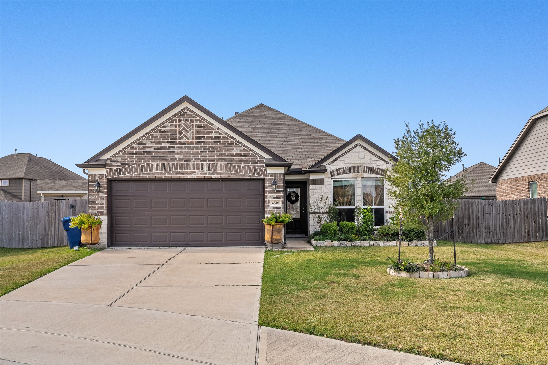 4518 Antero Court Rosenberg, TX 77471 - Photo 3 of 33 a front view of house with a garden
