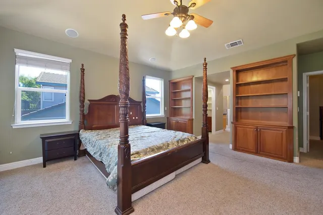 a utility room with sink dryer and washer