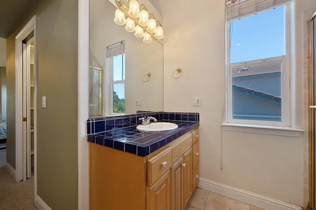 a view of balcony with wooden floor