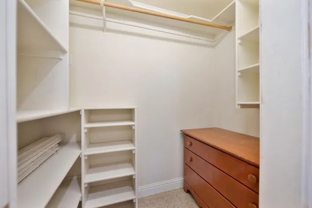a view of balcony with wooden floor