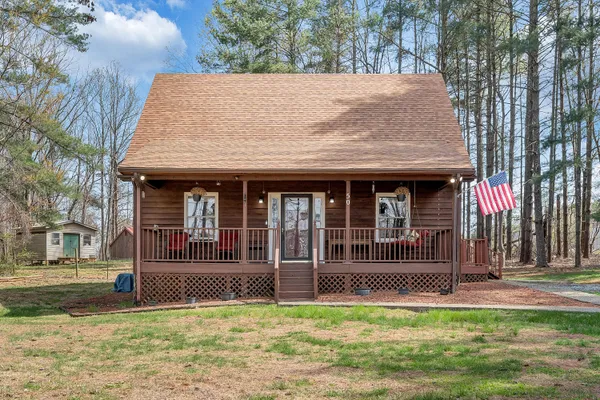 a view of a house with a garden