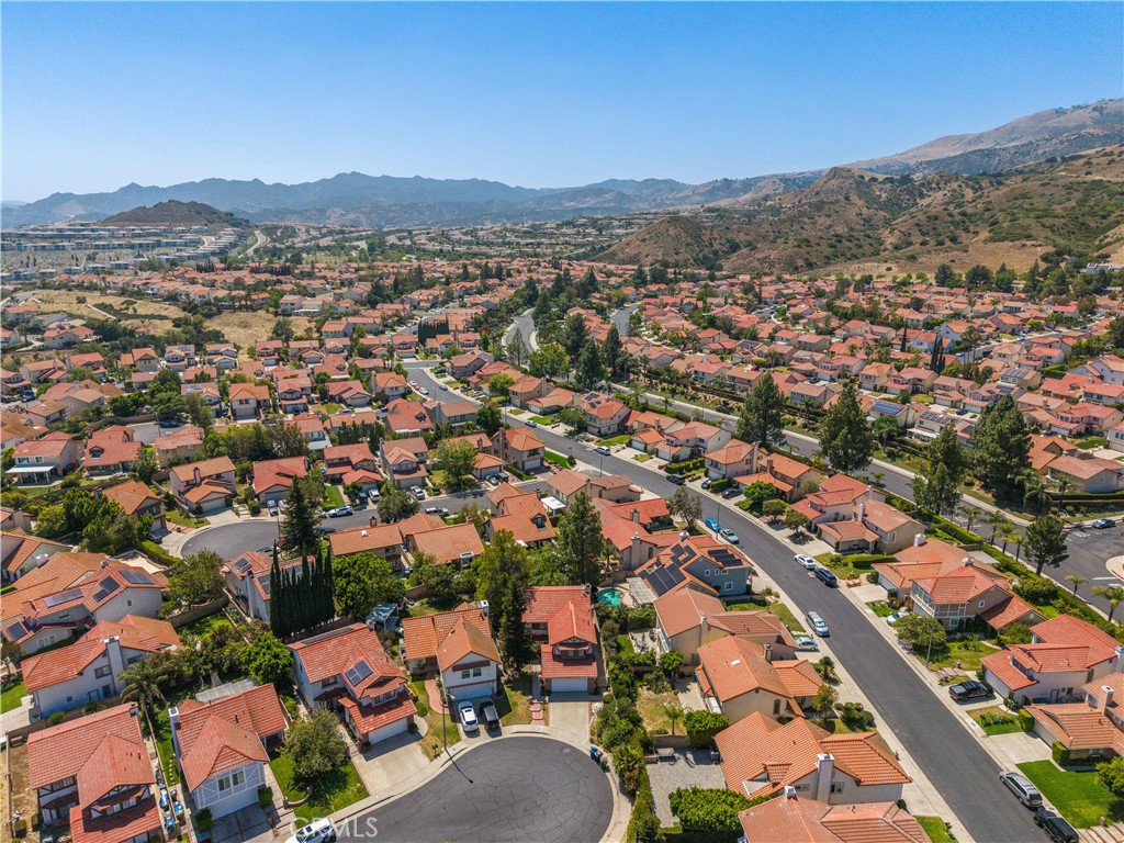 12065 Shadow Glen Lane Porter Ranch, CA 91326 - Photo 46 of 46 an aerial view of residential houses with outdoor space and street view