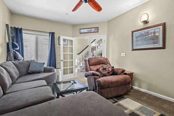 a living room with furniture and a window