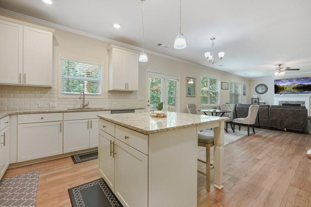 66 Snowdon Way Villa Rica, GA 30180 - Photo 16 of 52 a kitchen with a sink cabinets and window